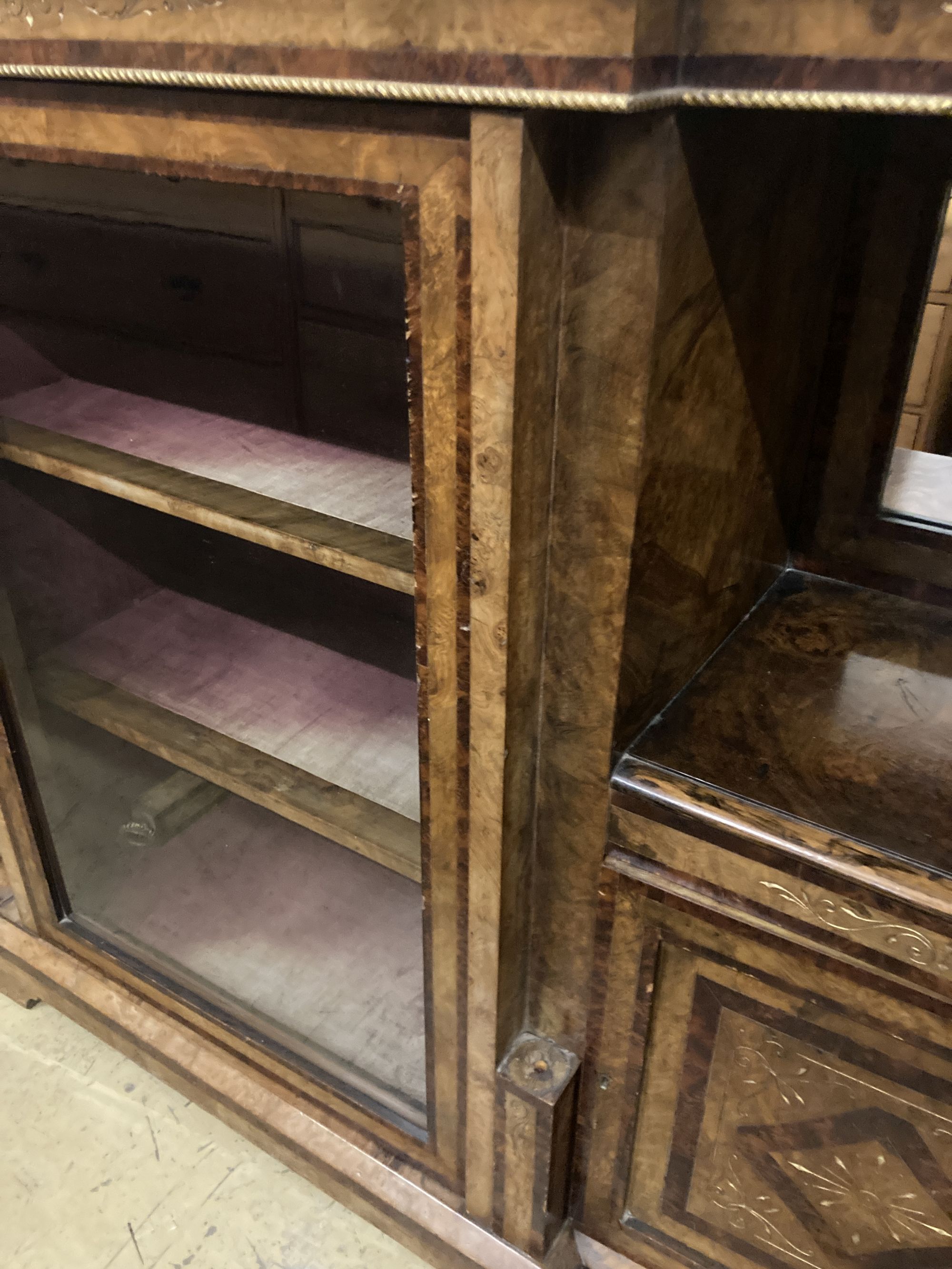 A late Victorian figured walnut breakfront side cabinet, width 168cm depth 43cm height 104cm